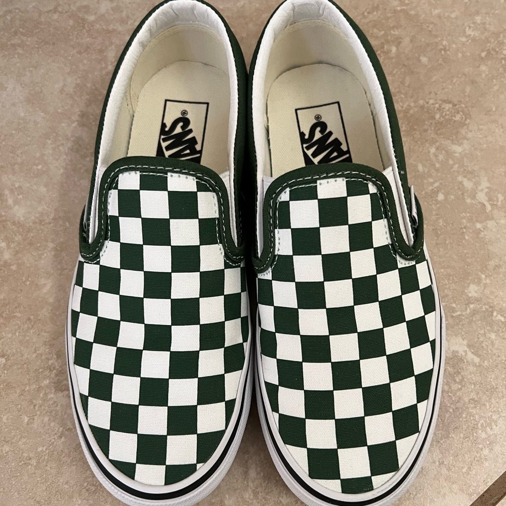 Green and white checkered Vans